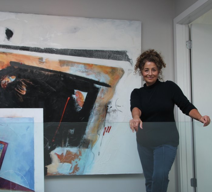 Sherri on Balcony with Paintngs